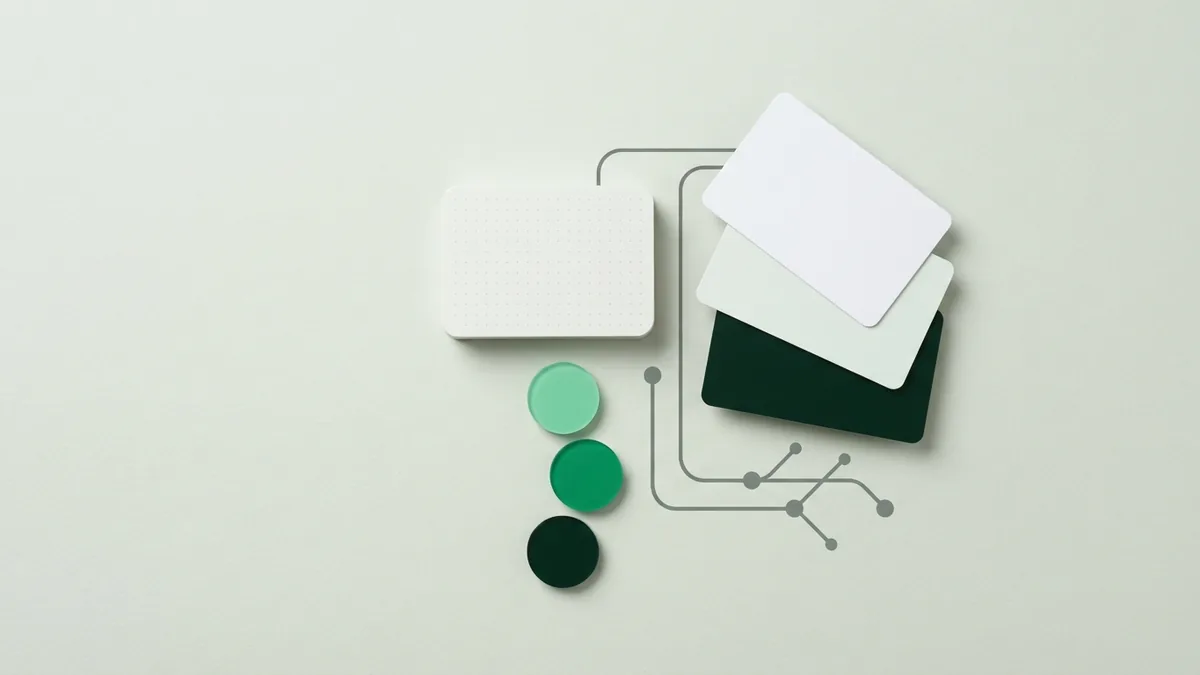 Abstract green ledger blocks and payment tokens representing key card terms